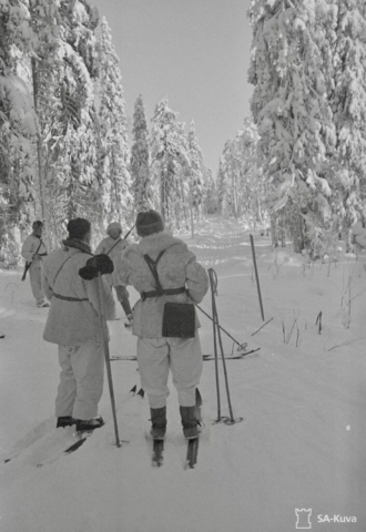 Finnish sentries on ski patrol. Note map case on the hip of the officer on the right. Photo credit SA-Kuva